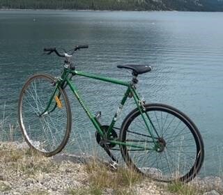The green bike is a Peugeot, single speed with two different tires, and the red bike is a 10-speed Marinoni, with bright orange after-market pedals and an expensive brown leather seat. VIA NANAIMO RCMP