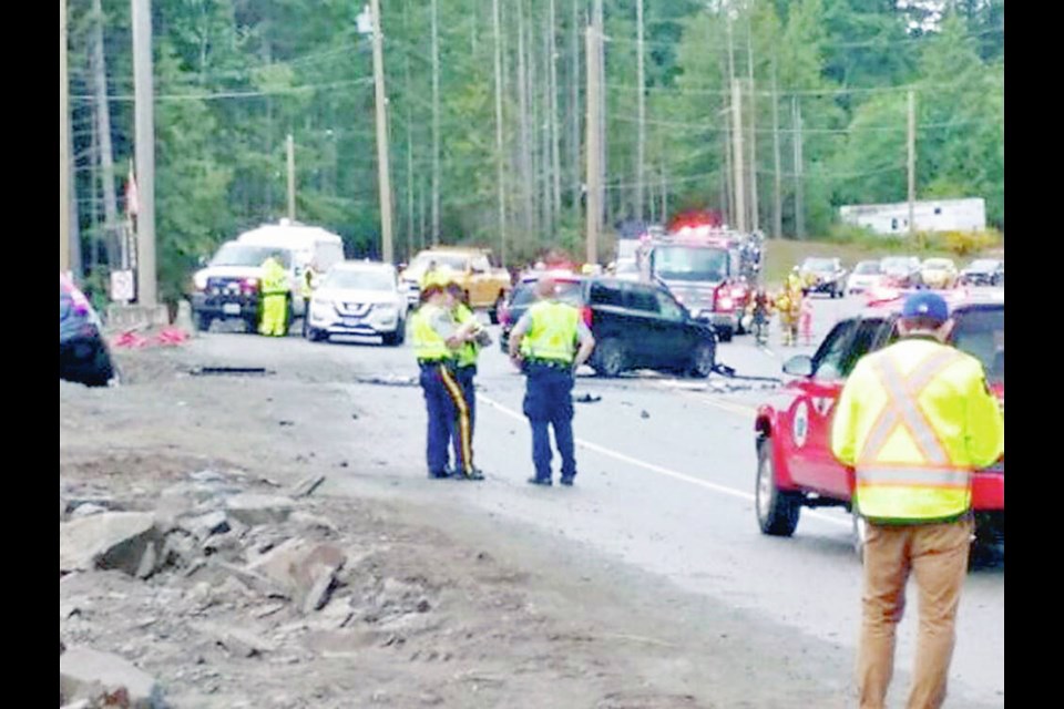 A minivan and SUV damaged on the scene of a serious accident on the Malahat on Saturday, June 9, 2018. CHEK News 