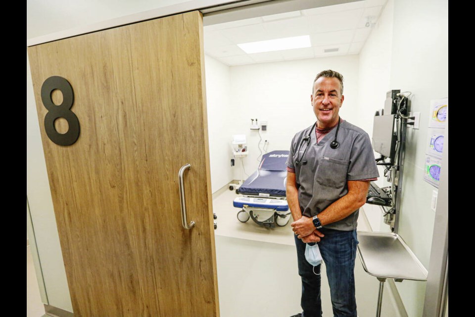 Dr. Alec Walton, the only physician hired so far, in front one of the medical rooms at the newly opened Urgent and Primary Care Centre at 890 Esquimalt Rd., on Monday. PHOTOS BY ADRIAN LAM, TIMES COLONIST 