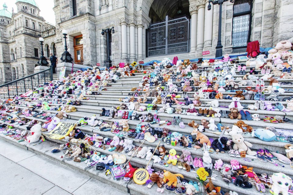 All summer, children's shoes crowded the legislature steps as a daily reminder of the lives lost at residential schools. DARREN STONE, TIMES COLONIST 