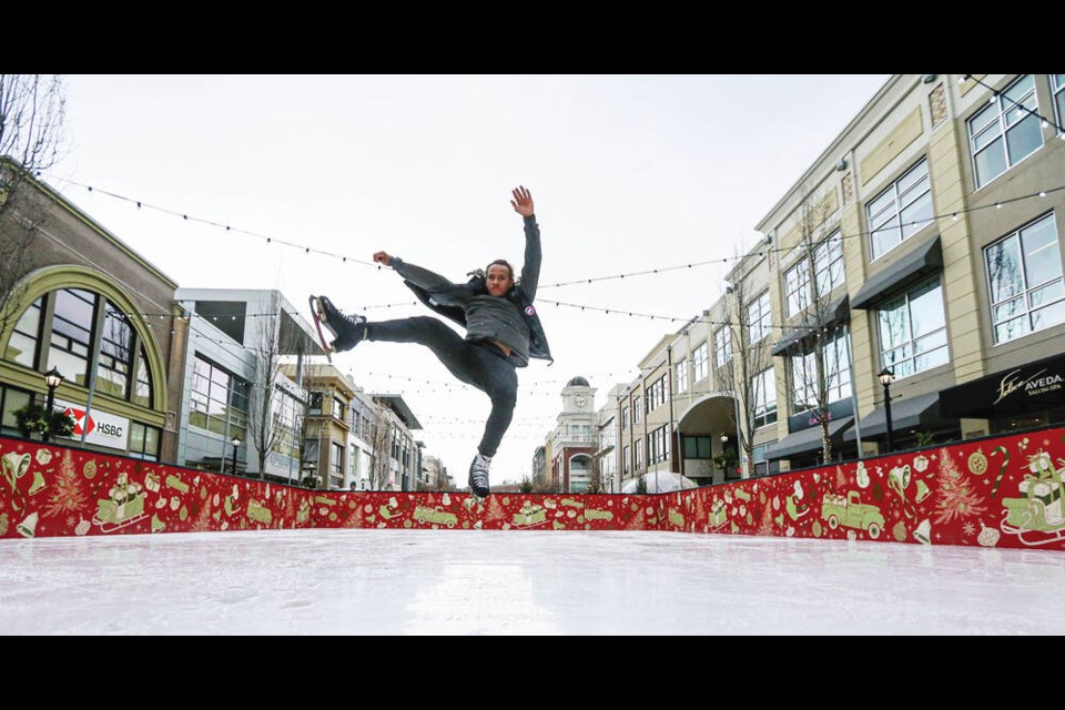 Stars On Ice cast member Elladj Baldé performs Wednesday on an 18-metre-long synthetic skating rink set up at Uptown shopping centre. The rink opens to the public on Dec. 6. ADRIAN LAM, TIMES COLONIST 
