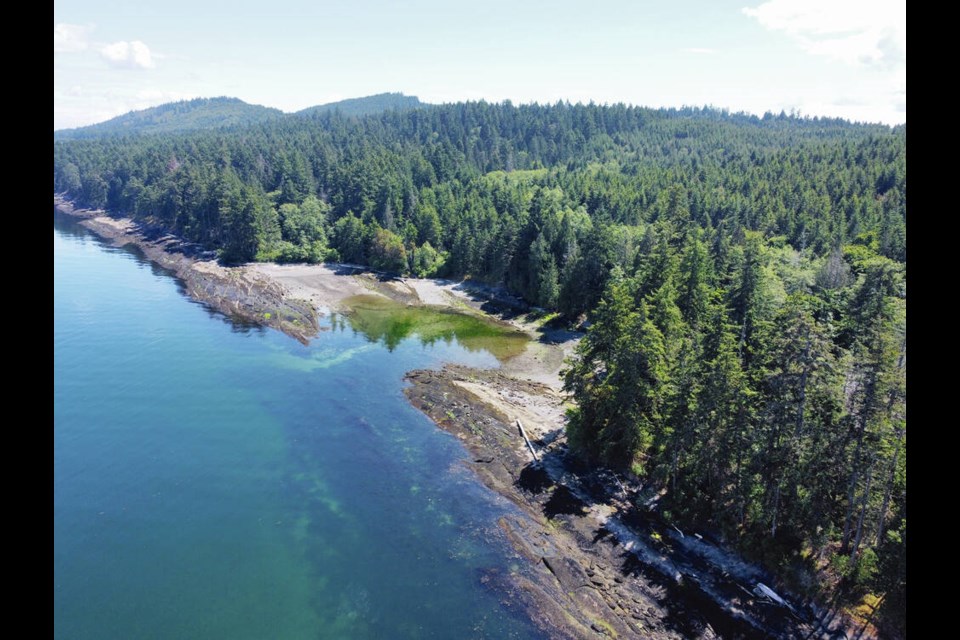 An aerial photo, taken by a drone, shows the pristine rocky shoreline at Cable Bay on Galiano Island. The property is part of a 26.5-hectare parcel of land recently sold to the Galiano Conservancy Association and The Nature Trust of B.C.  Via Galiano Conservancy Association 