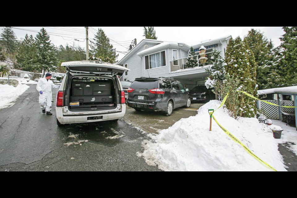 Langford RCMP and the coroner investigate at the scene of a homicide at Arbutus Ridge Estates in Langford on Jan. 1, 2022. ADRIAN LAM, TIMES COLONIST