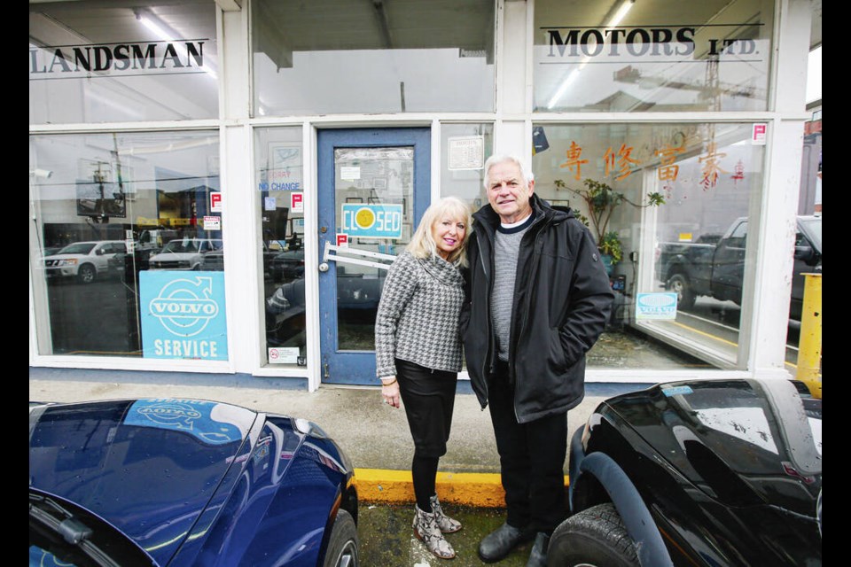 Pavla and Peter Landsman in front of Landsman Motors on Store Street. ADRIAN LAM, TIMES COLONIST 