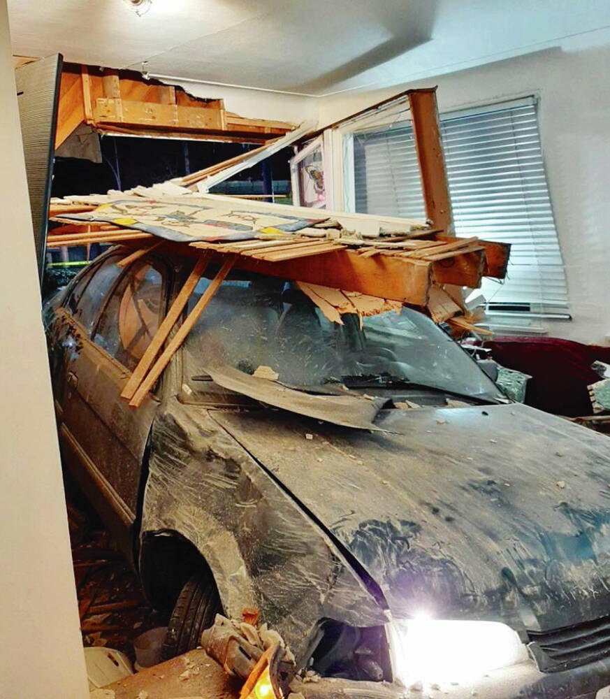 Car crashes into living room of Victoria apartment - Victoria Times Colonist