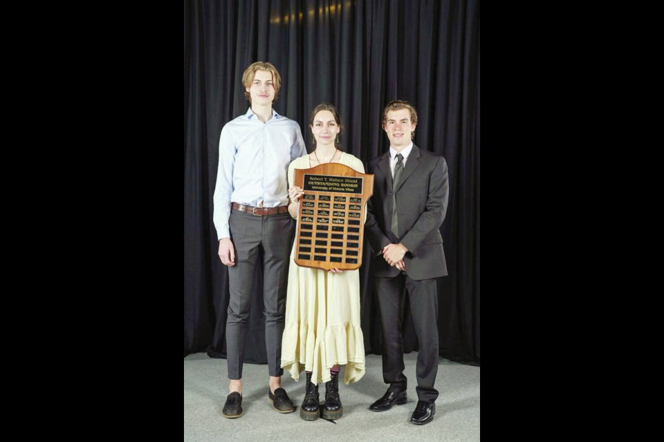 Vikes guard Elias Ralph, left, swimmer Sophie Tarrant and rower Giancarlo DiPompeo were co-winners of the rookies-of-the-year trophy. UVIC VIKES 