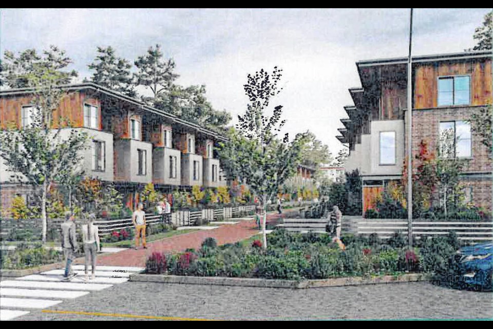 An artist's rendering of the proposed mixed-use, village-type development in Lantzville, looking from 
an internal public road into a townhouse development with a pedestrian trail. Via District of Lantzville 