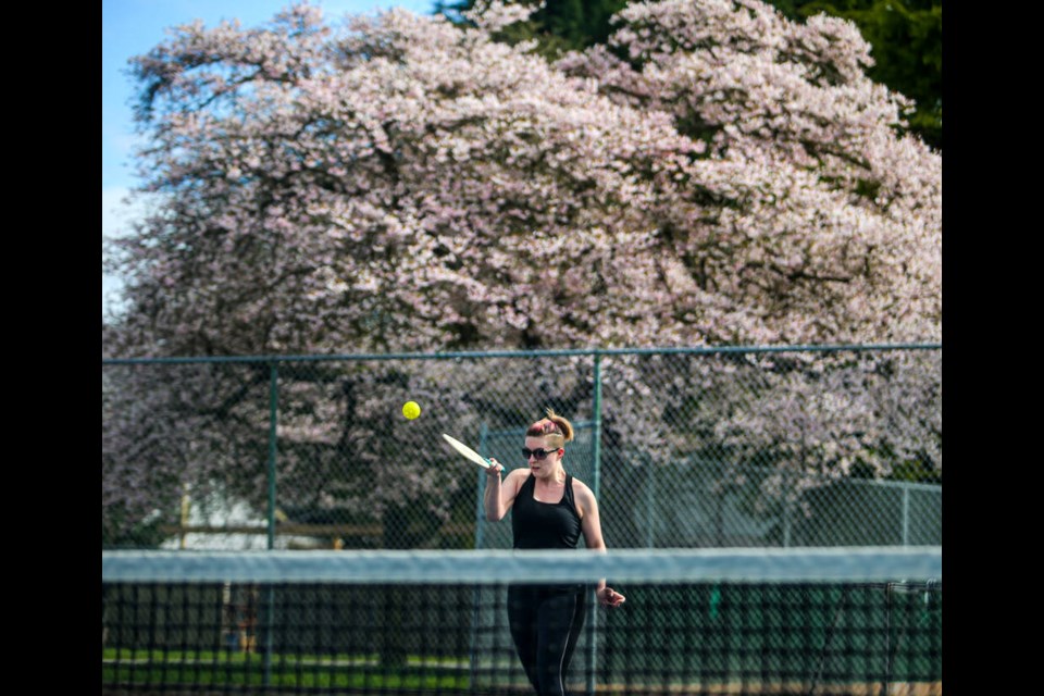 Beth Nessim plays pickleball with a friend at the Oaklands Park courts. The sport reportedly grew by 30 per cent over the past few years as people looked for activities during the pandemic. ADRIAN LAM, TIMES COLONIST 