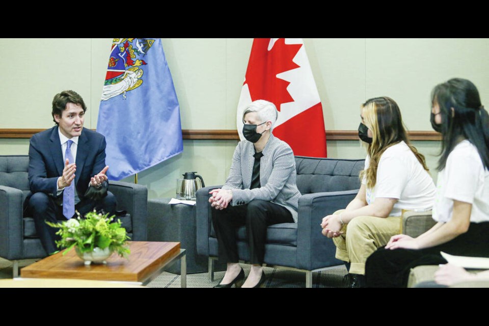 Prime Minister Justin Trudeau meets with Mayor Lisa Helps and members of the City of Victoria Youth Advisory Council, at Victoria City Hall on Monday. ADRIAN LAM, TIMES COLONIST 