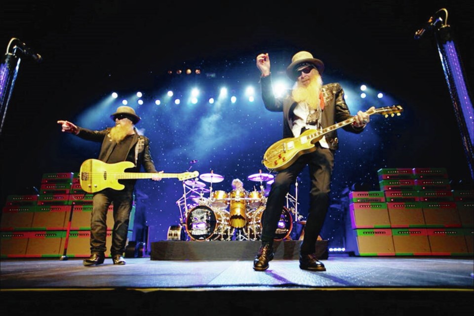 ZZ Top's performance Friday at the Save-on-Foods Memorial Centre will be its first on local soil without bassist Dusty Hill, left, who died suddenly in July. The band is pictured here during its 2016 performance at the arena. Credit: DARREN STONE 