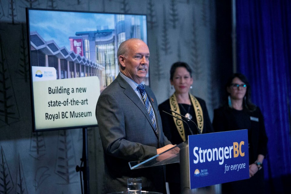 Premier John Horgan announces funding for a new Royal B.C. Museum alongside Culture Minister Melanie Mark and RBCM CEO Alicia Dubois in Victoria on Friday, May 13, 2022. DARREN STONE, TIMES COLONIST