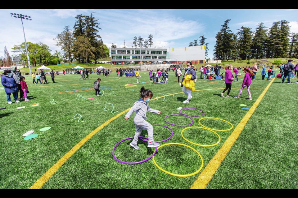 The new turf field at the Pacific Institute for Sports Excellence attracted sports enthusiasts of all ages to the 11th Family Sport and Recreation Festival. DARREN STONE, TIMES COLONIST 