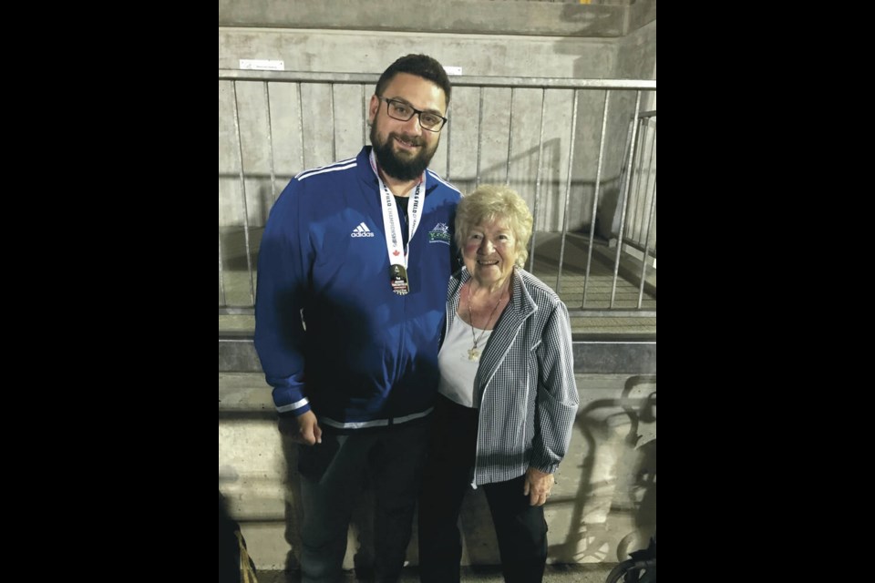 Canadian hammer-throw champion Adam Keenan of Victoria with his grandmother and biggest supporter Patsy Stewart.  VIA PATTI KEENAN 