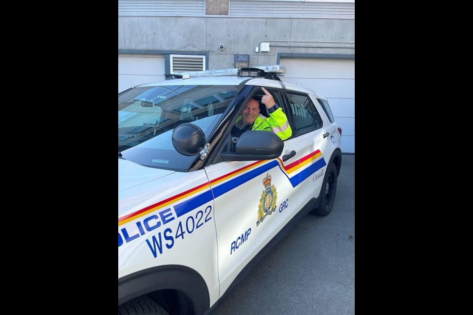 A West Shore RCMP traffic officer points to the camera of the automatic licence-plate recognition system mounted atop his patrol vehicle. The system can identify stolen or uninsured vehicles and warn officers of unlicenced drivers or those with outstanding B.C. and Canada-wide warrants. VIA RCMP 