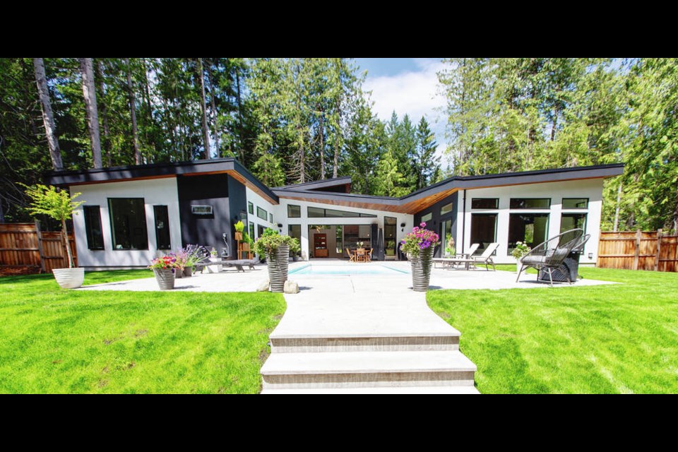 The home sits on a one-acre, level lot with mature trees surrounding it providing plenty of privacy the couple was seeking. DARREN STONE, TIMES COLONIST