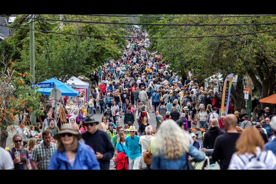 Crowds fill Moss Street during the 33rd annual TD Art Gallery Paint-In on Saturday. DARREN STONE, TIMES COLONIST. July 16, 2022 