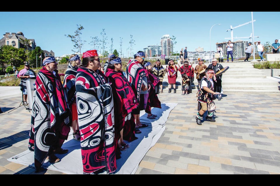 The Lekwungen Traditional Dancers and Esquimalt Dancers perform at the official reopening of the Songhees Park near the Johnson Street Bridge in Victoria on Monday, July 25, 2022. DARREN STONE, TIMES COLONIST 