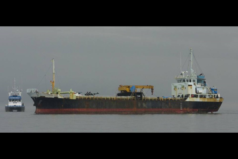 Oct. 17, 2009: The Canadian Forces, Canada Border Services Agency and police accompany MV Ocean Lady to Victorias Ogden Point. DEBRA BRASH, TIMES COLONIST 