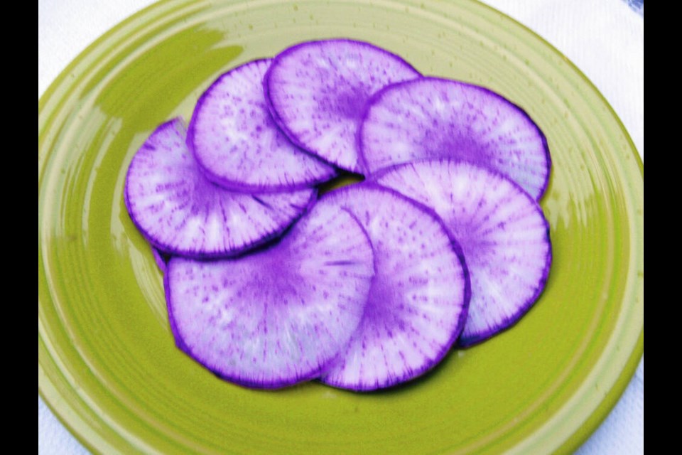 Some daikon radishes have beautifully coloured flesh. This KN-Bravo from Johnny's Selected Seeds is harvested and used through the fall and winter. HELEN CHESNUT 