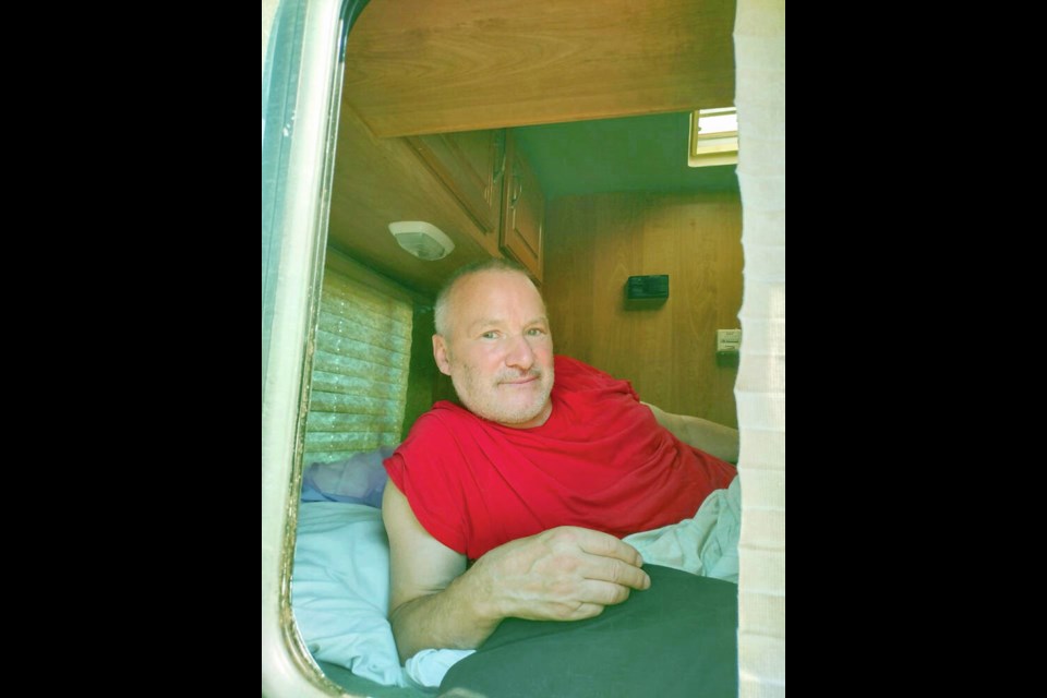 Gerald Lee of Duncan lives in his RV in Duncan. After an incident where his windshield was smashed by a thrown rock, he moved to a better-lit area near the highway. KEITH SIMMONDS  