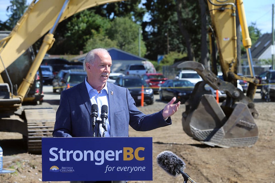 Premier John Horgan makes an announcement about expanding post-secondary education for students on the West Shore in Langford on Wednesday, Aug. 3, 2022.  ADRIAN LAM, TIMES COLONIST