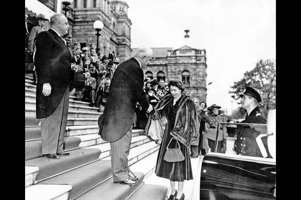 Then Princess Elizabeth and Prince Philip are greeted by Premier Byron Johnson on the steps of the B.C. legislature during their October 1951 royal tour. Times Colonist file photo 
