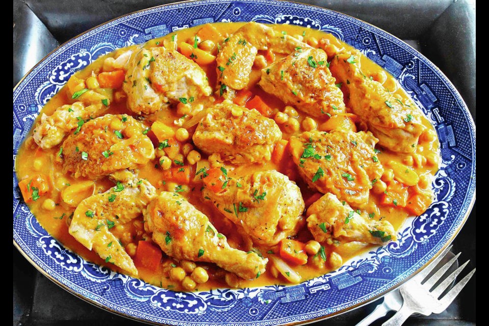 Chicken and Chickpea Casserole, baked with spices, apricots and citrus, will appeal to both light- and dark-meat lovers. ERIC AKIS PHOTOS