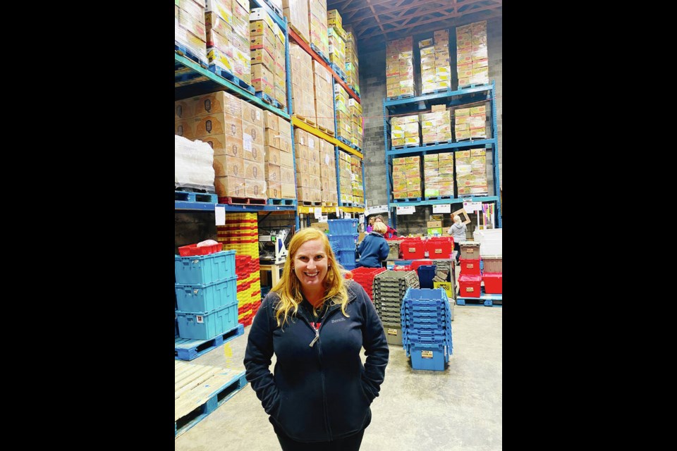 Abby Sauchuk at the Loaves and Fishes warehouse in Nanaimo. We have to be a food pipe, not a food bank. TIMES COLONIST 