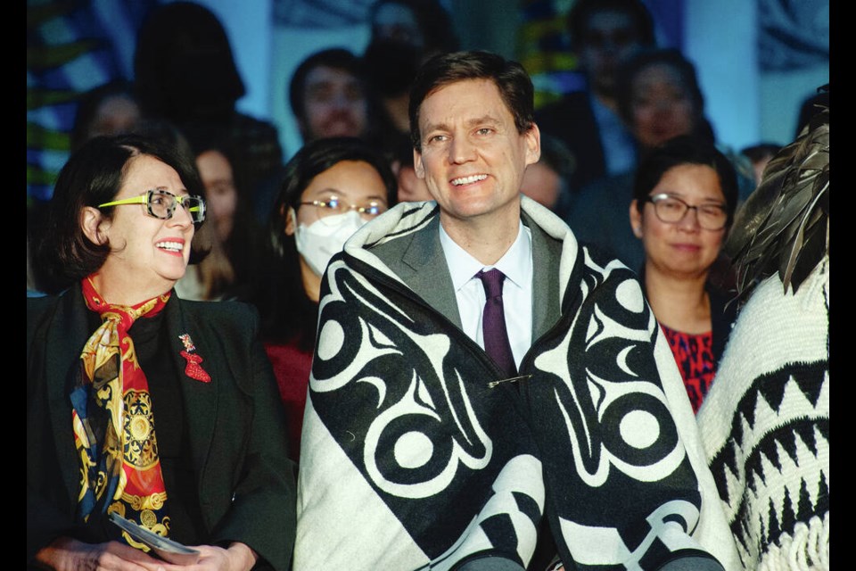 David Eby wears a ceremonial First Nations blanket at his swearing-in ceremony at the Musqueam Community Centre. Jason Payne/PNG 