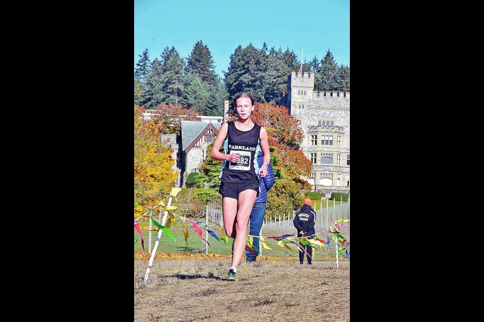 Ruby Broadbent from Parkland Secondary School on the 5K course at the B.C. high school cross-country championships at Royal Roads University on Saturday. JOSEPH CAMILLERI 