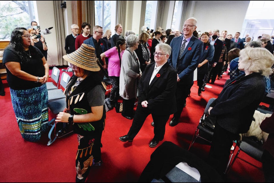 Lekwungen traditional dancers lead the new mayor, Marianne Alto, and city councillors to the swearing-in ceremony at Victoria City Hall on Thursday. DARREN STONE, TIMES COLONIST 