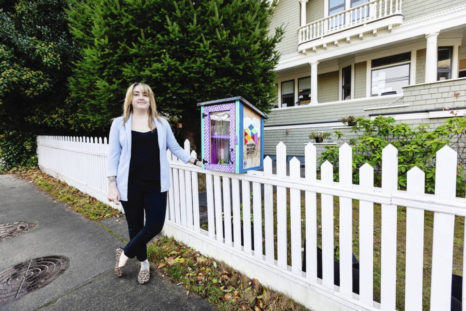 Threshold Housing Society program director Kacie Stirrett in front of the societys James Bay home, which houses a Supportive Recovery Program for at-risk youth. DARREN STONE, TIMES COLONIST 