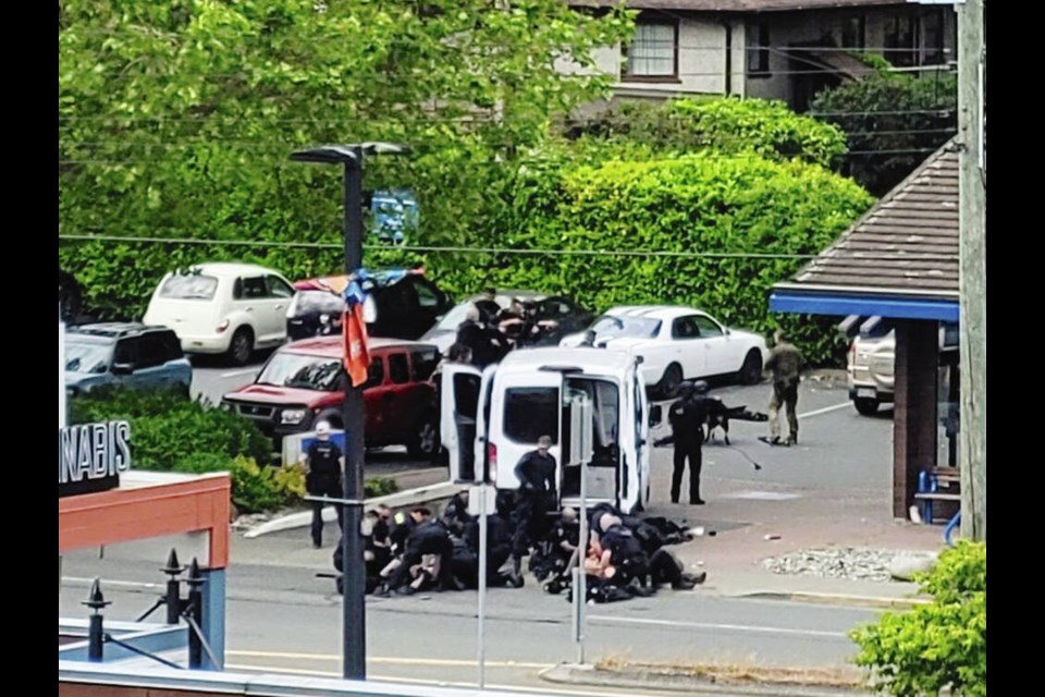 The aftermath of the shootout outside the Bank of Montreal at Shelbourne and Pear streets in Saanich on June 28. COURTESY JOAN B. FLOOD 