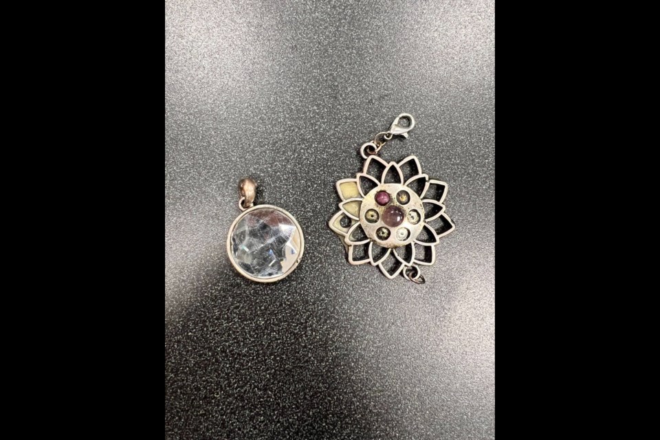 A woman who died in a fire on Nov. 11, 2022, had these pendants in her possession. VICTORIA POLICE DEPARTMENT
