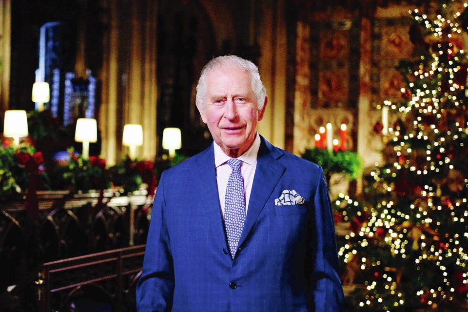 Britain's King Charles III delivers his message during the recording of his first Christmas broadcast in the Quire of St George's Chapel at Windsor Castle, Berkshire, England, Tuesday, Dec. 13, 2022. King Charles III evoked memories of his late mother, Queen Elizabeth II, as he broadcast his first Christmas message as monarch on Sunday, Dec. 25, 2022, in a speech that also paid tribute to the “selfless dedication” of Britain’s public service workers, many of whom are in a fight with the government over pay. (Victoria Jones/Pool Photo via AP)