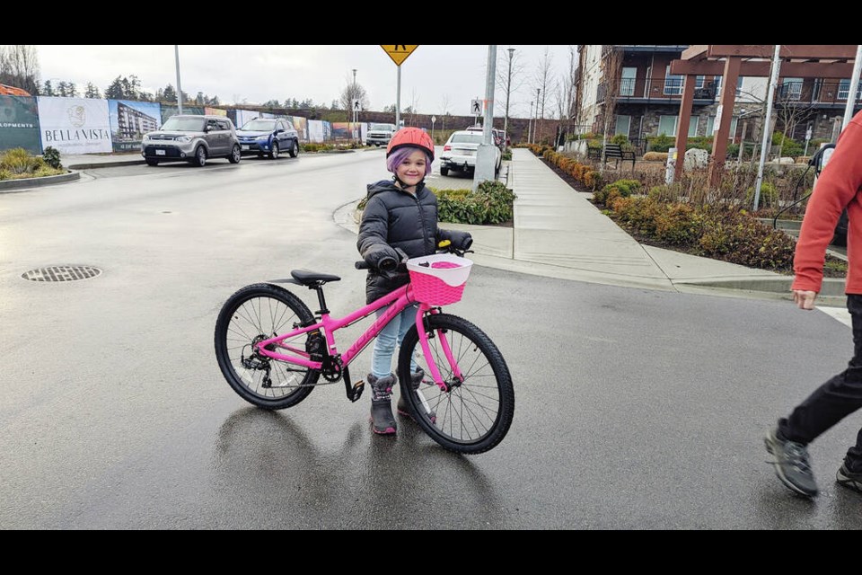 Ramsey Frombach with her new bike. Via Kelsey Frombach 