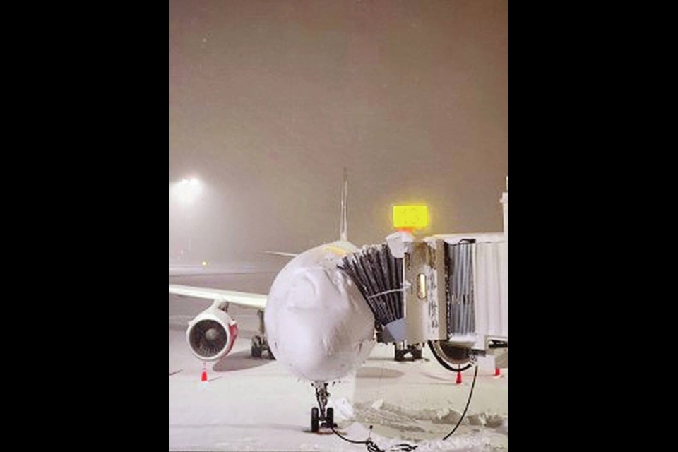 The main runway at Victoria International Airport crews is open, but flights were cancelled on Friday morning. Via Mohammad Meidany of the Victoria Airport Authority. 