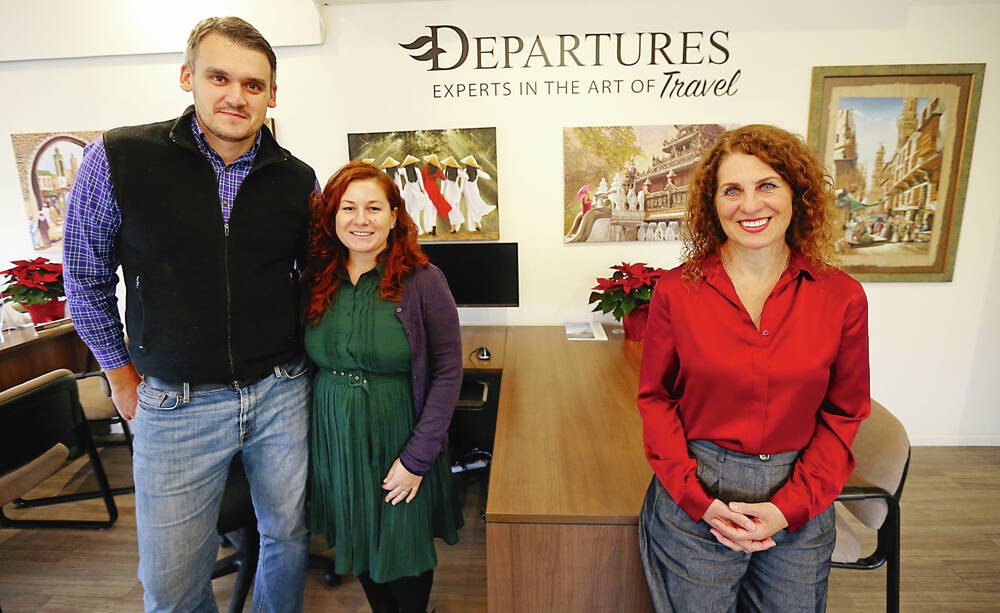 Ukrainian travel agents rebuild lives in Victoria