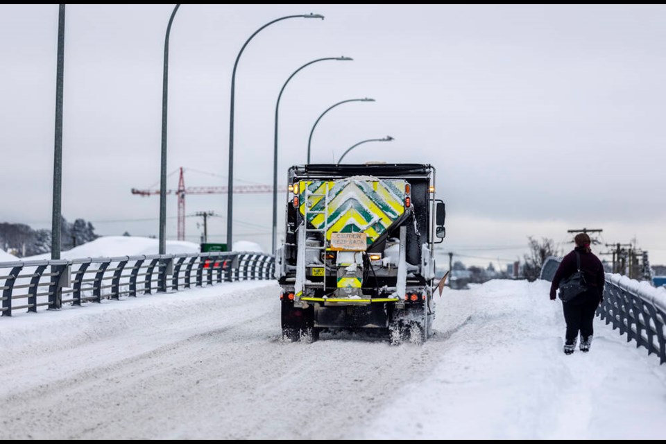 A City of Victoria salt truck crosses the Bay Street Bridge on Tuesday morning. DARREN STONE, TIMES COLONIST 