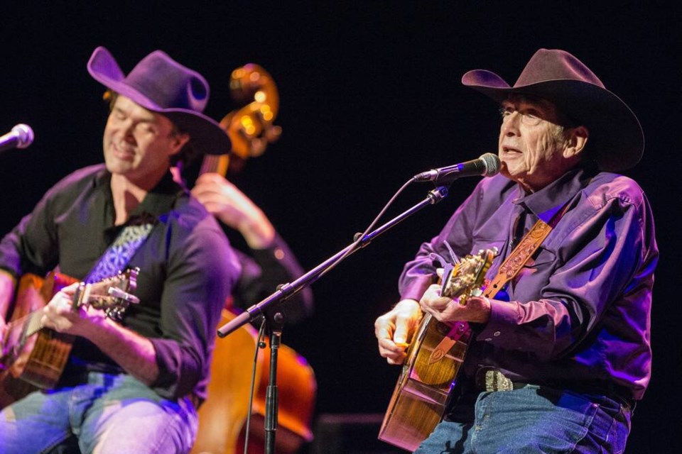 Ian Tyson, right, performs with Corb Lund at the Royal Theatre in Victoria on Jan. 9, 2018. Tyson, best known for the hit single "Four Strong Winds" as one half of Ian & Sylvia, has died at age 89. DARREN STONE, TIMES COLONIST