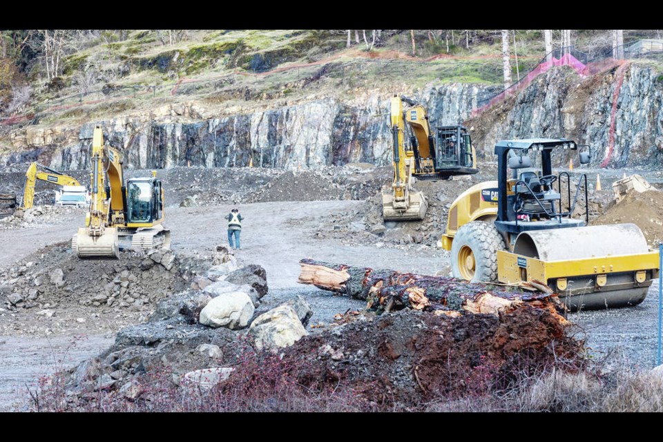 Draycor Construction carries out grading and levelling on Thursday at what will be Sooke School Districts next elementary school, near the corner of Latoria Road and Klahanie Drive. DARREN STONE, TIMES COLONIST 
