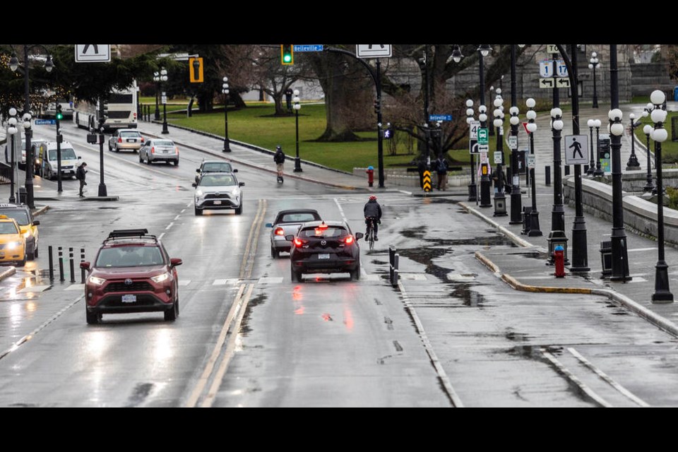 Rain falls on Government Street in the Inner Harbour on Thursday. DARREN STONE, TIMES COLONIST 