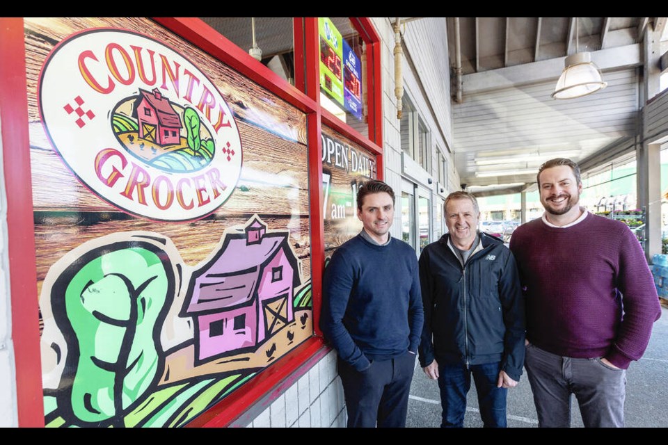 From left, Country Grocer director Andrew Cavin, co-owner Peter Cavin and director Craig Cavin at the Royal Oak location. Craig Cavin says the purchase of the 49th Parallel stores is "one step in the start of a few that we're going to take long-term." DARREN STONE, TIMES COLONIST 
