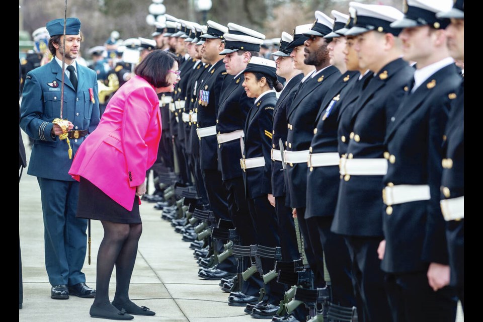 Lt.-Gov. Janet Austin inspects the 50-member Guard of Honour, Maritime Forces Pacific, before reading the speech from the throne at the B.C. legislature Monday. DARREN STONE, TIMES COLONIST 