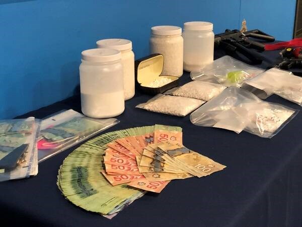 Drugs and money seized by police. Via West Shore RCMP 