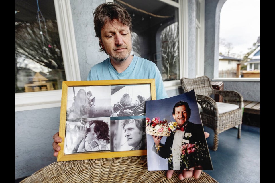 Nik Sillem with photos of his dad, Alfred Sillem, who was known around Victoria as Alfred the Flowerman. DARREN STONE, TIMES COLONIST