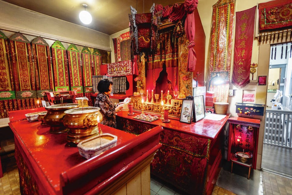 Nora Butz of the Yen Wo Society in the Tam Kung Temple. DARREN STONE, TIMES COLONIST 