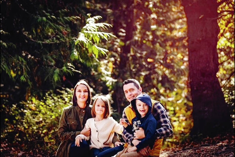 Brent and Lindsay Wilson with twins Ava and Eli, who turned eight on Monday. Eli, who has autism, uses sleep medication but in February 2021, what was dispensed from the pharmacy was 14 times the prescribed potency. The Wilsons are warning other parents of what can happen. FAMILY PHOTO 