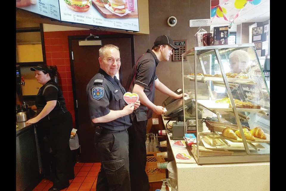 Assistant Chief Lance Caven at the Millstream McDonalds in May of 2017, raising money for Jeneece Place and Ronald McDonald House. LANGFORD FIRE RESCUE VIA FACEBOOK 