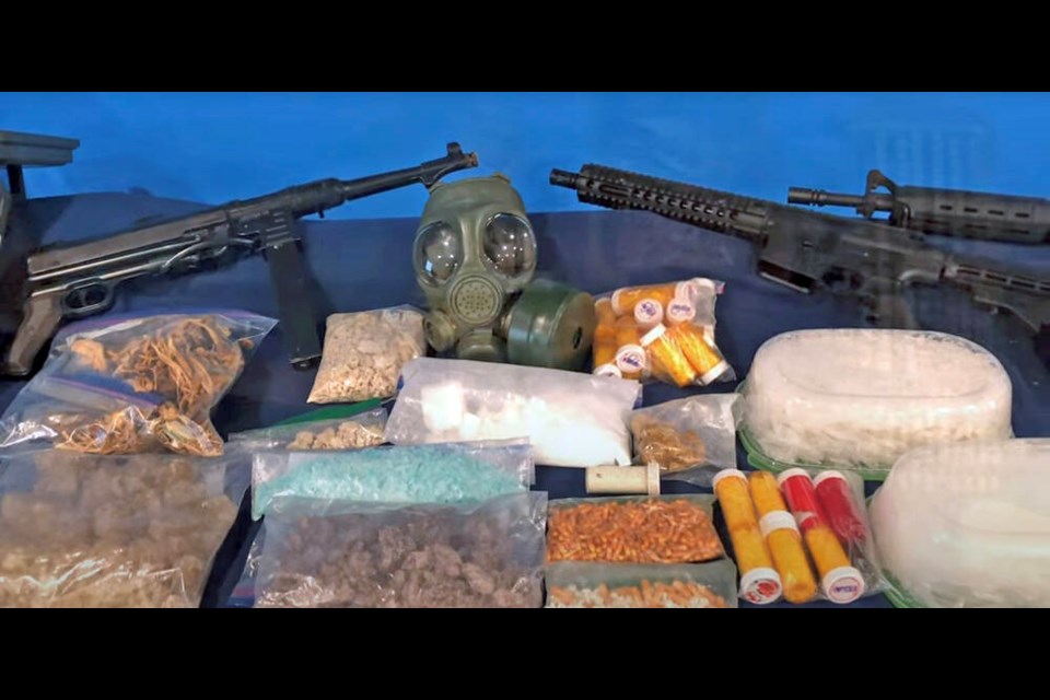 Drugs and weapons seized when multiple police groups carried out search warrants in Langford, Saanich, Victoria and the Malahat area this month. VIA WEST SHORE RCMP